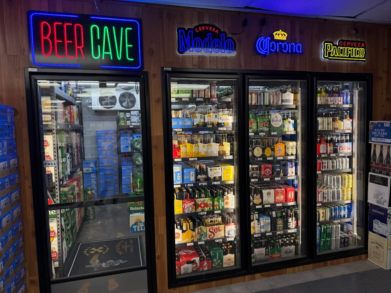 Inside JOCO Liquor & Vape in Olathe — the cold beer cave and refrigerated beer selection